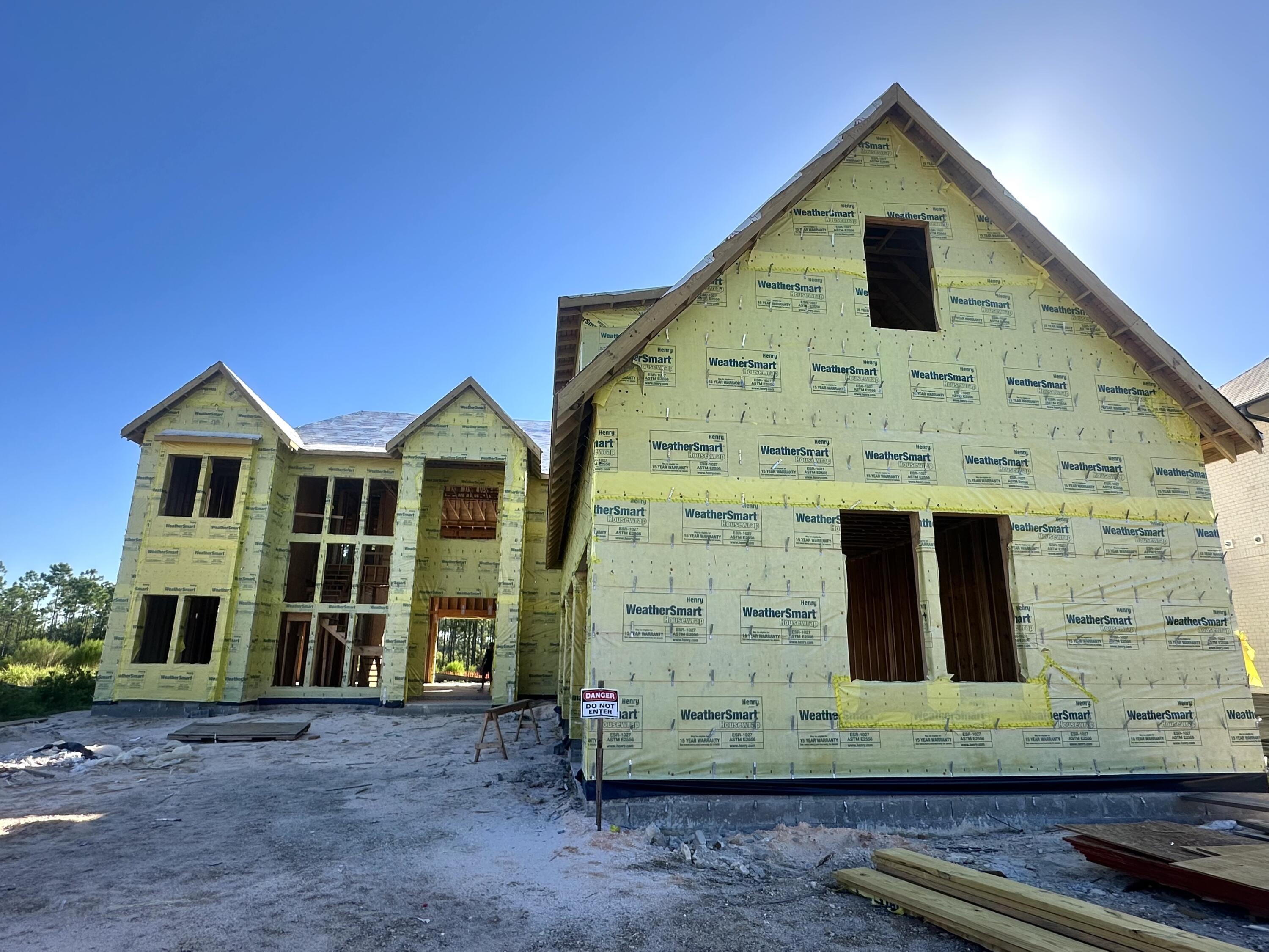 109 Norman Ct Inlet Beach Inlet Beach, FL 32461 - Photo 14 of 25 a front view of a house with a yard