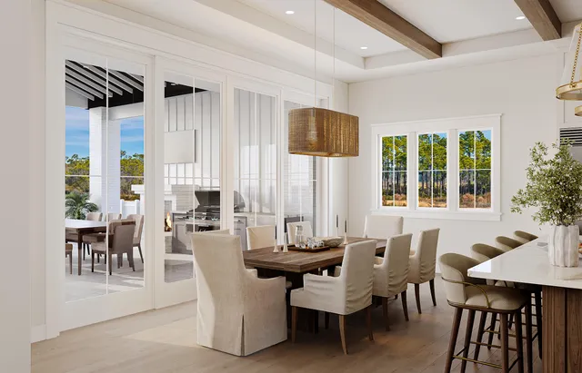 a view of a dining room with furniture and window