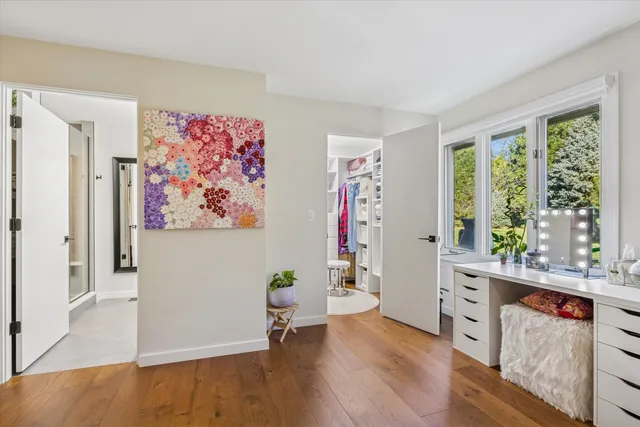 a workspace with furniture and window