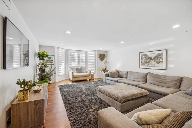 a living room with furniture and a couch