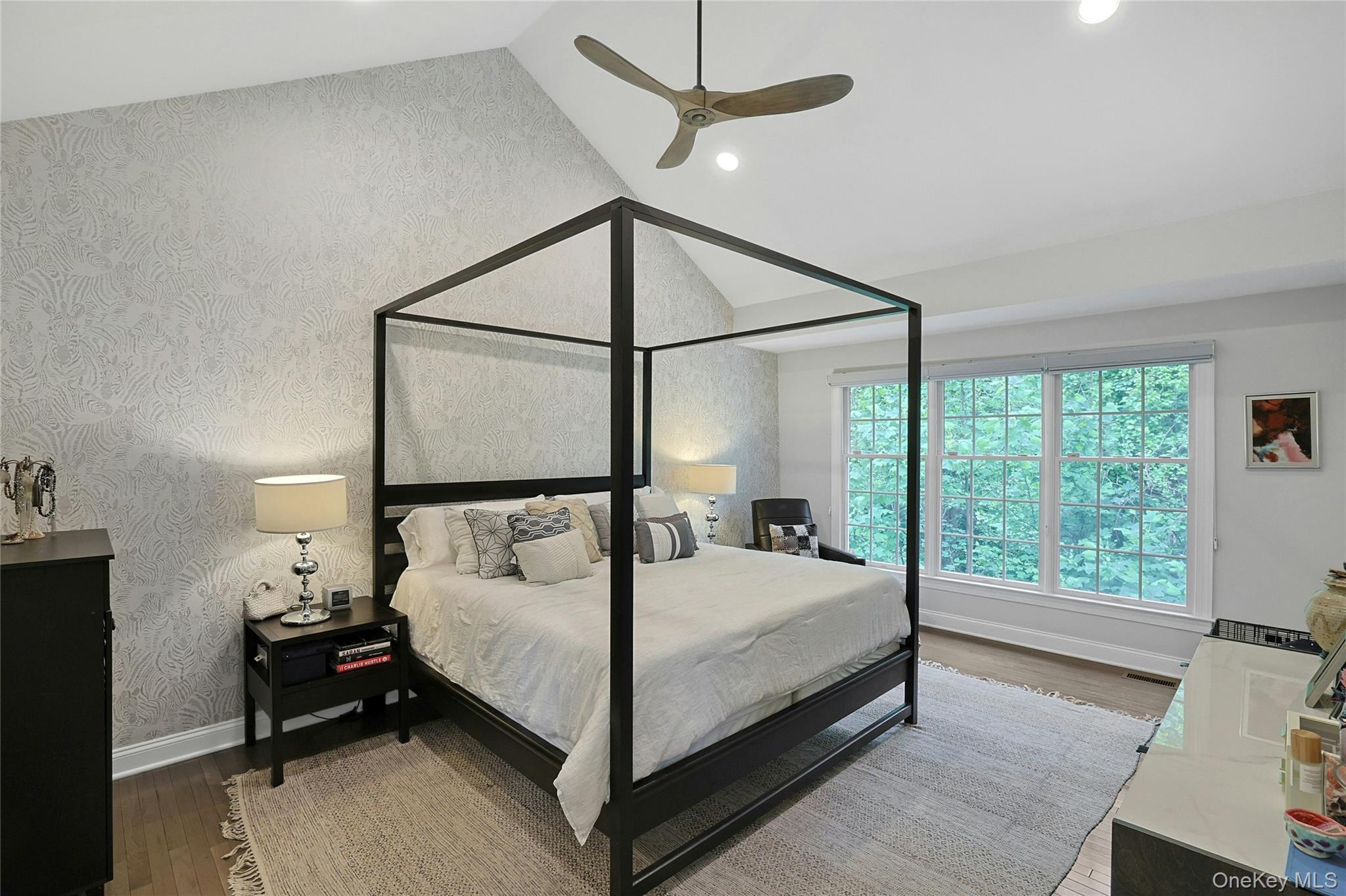 26 Agnew Farm Road Armonk, NY 10504 - Photo 19 of 28 a bedroom with a bed lamp and a window