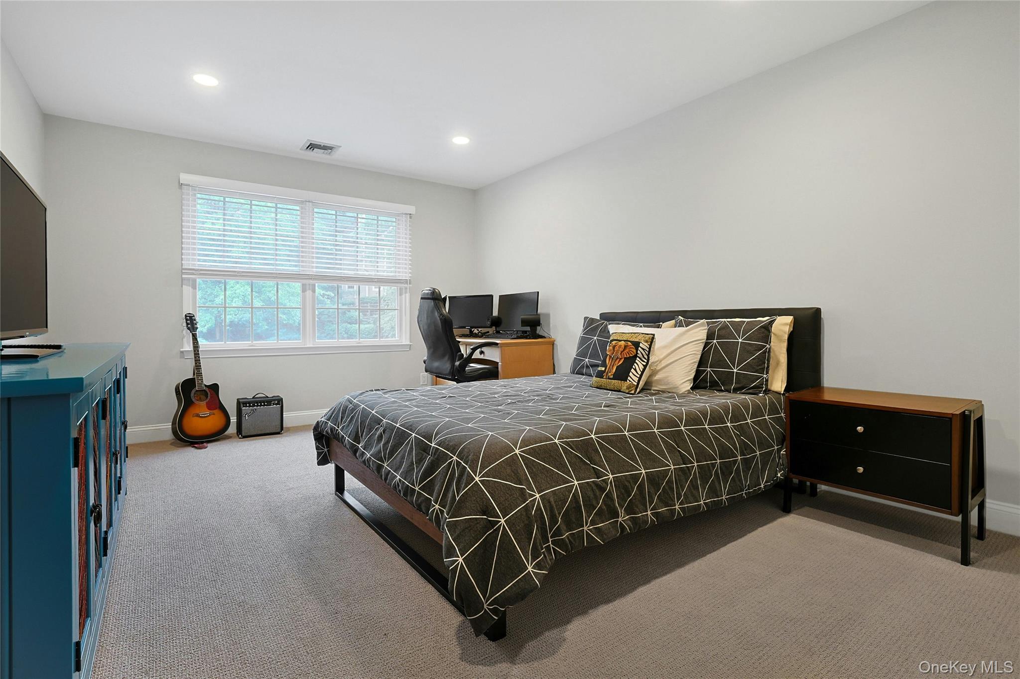 26 Agnew Farm Road Armonk, NY 10504 - Photo 22 of 28 a bedroom with a bed and a window