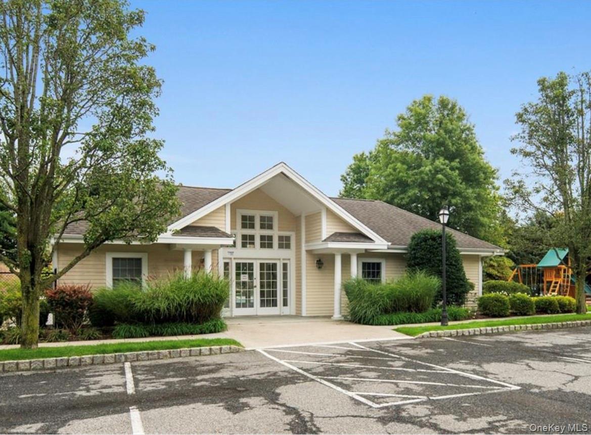 26 Agnew Farm Road Armonk, NY 10504 - Photo 25 of 28 a front view of a house with a yard