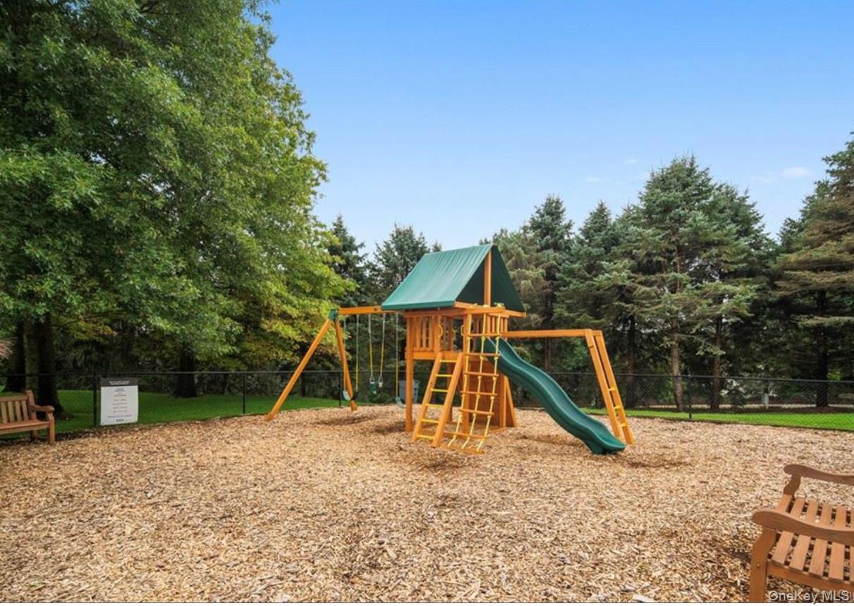 26 Agnew Farm Road Armonk, NY 10504 - Photo 26 of 28 a view of a park with a slide