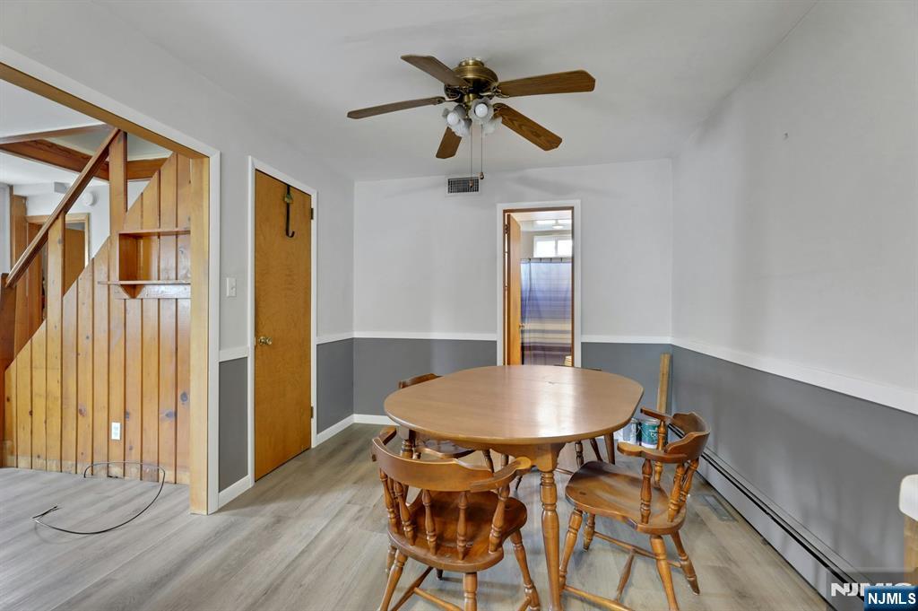 17 Butler Place Wanaque, NJ 07420 - Photo 15 of 28 a dining room with furniture and window