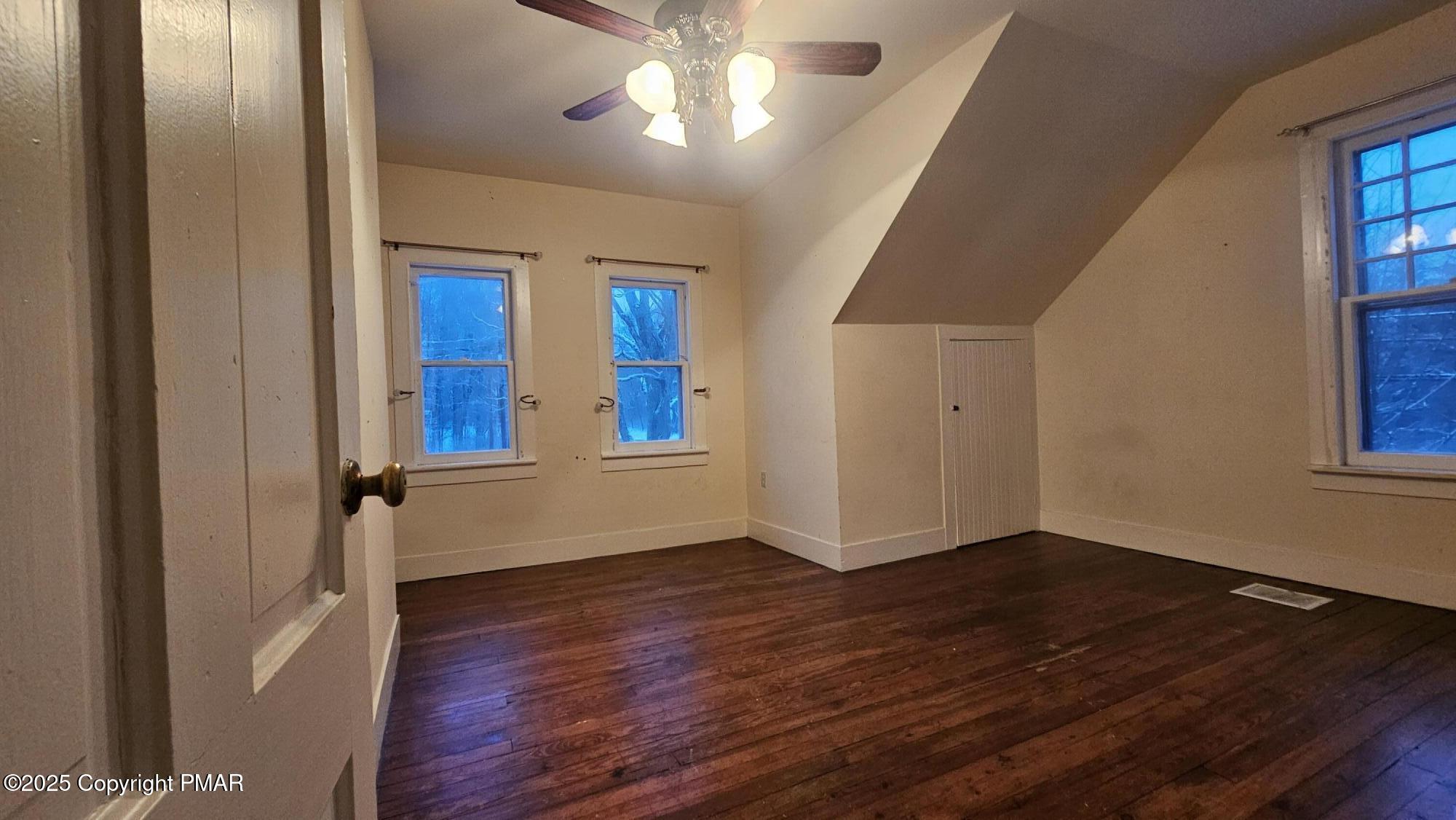 121 Hardytown Road Cresco, PA 18326 - Photo 13 of 35 a view of an empty room with wooden floor and a window