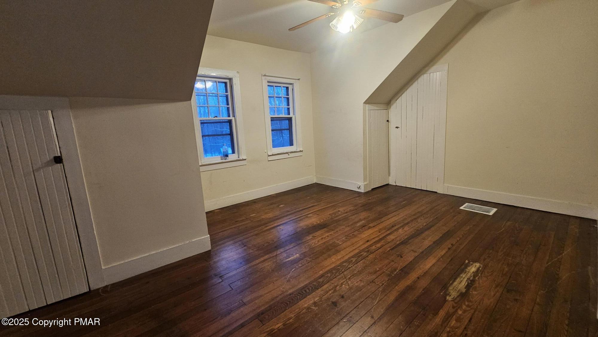 121 Hardytown Road Cresco, PA 18326 - Photo 14 of 35 wooden floor in an empty room with a window