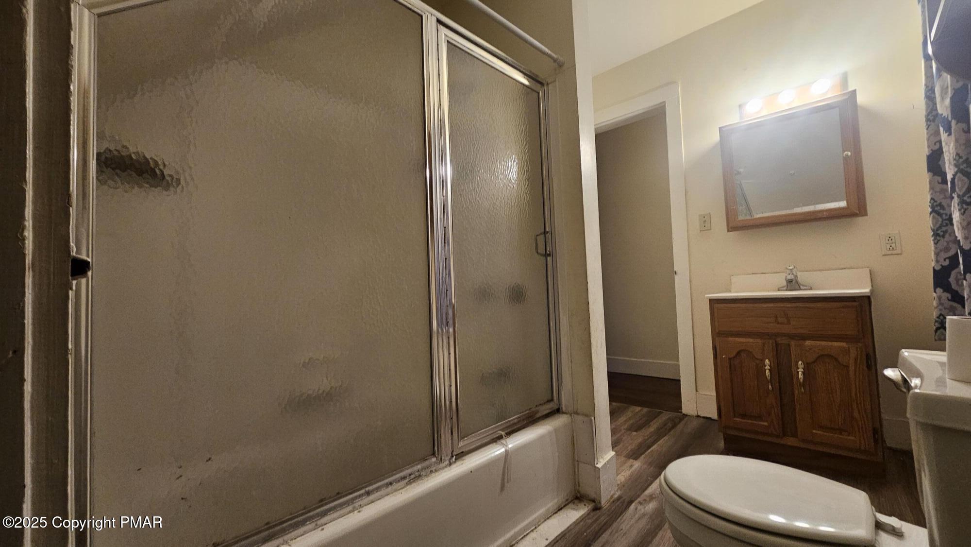 121 Hardytown Road Cresco, PA 18326 - Photo 15 of 35 a bathroom with a toilet a sink and shower