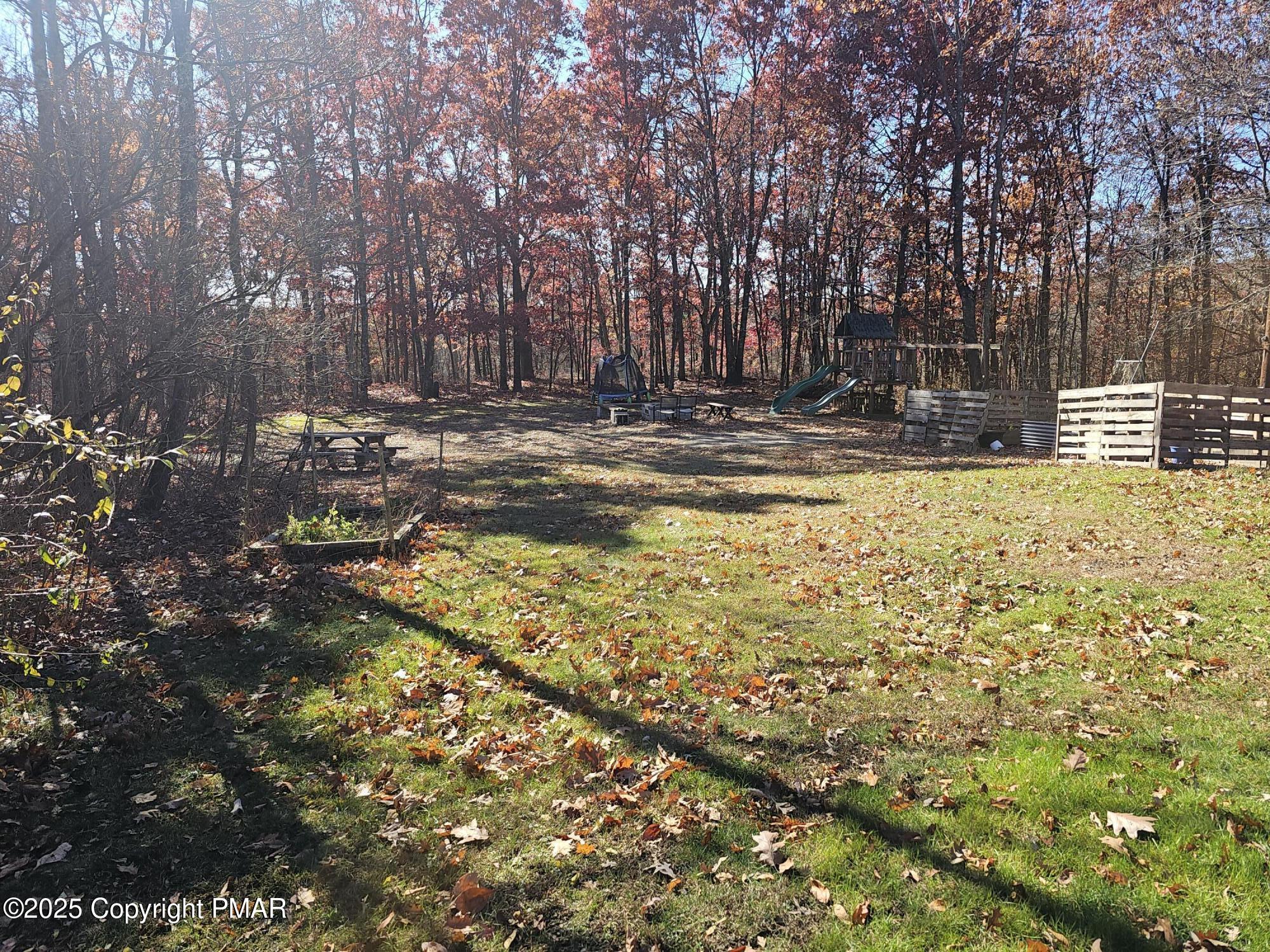121 Hardytown Road Cresco, PA 18326 - Photo 23 of 35 a view of swimming pool with trees