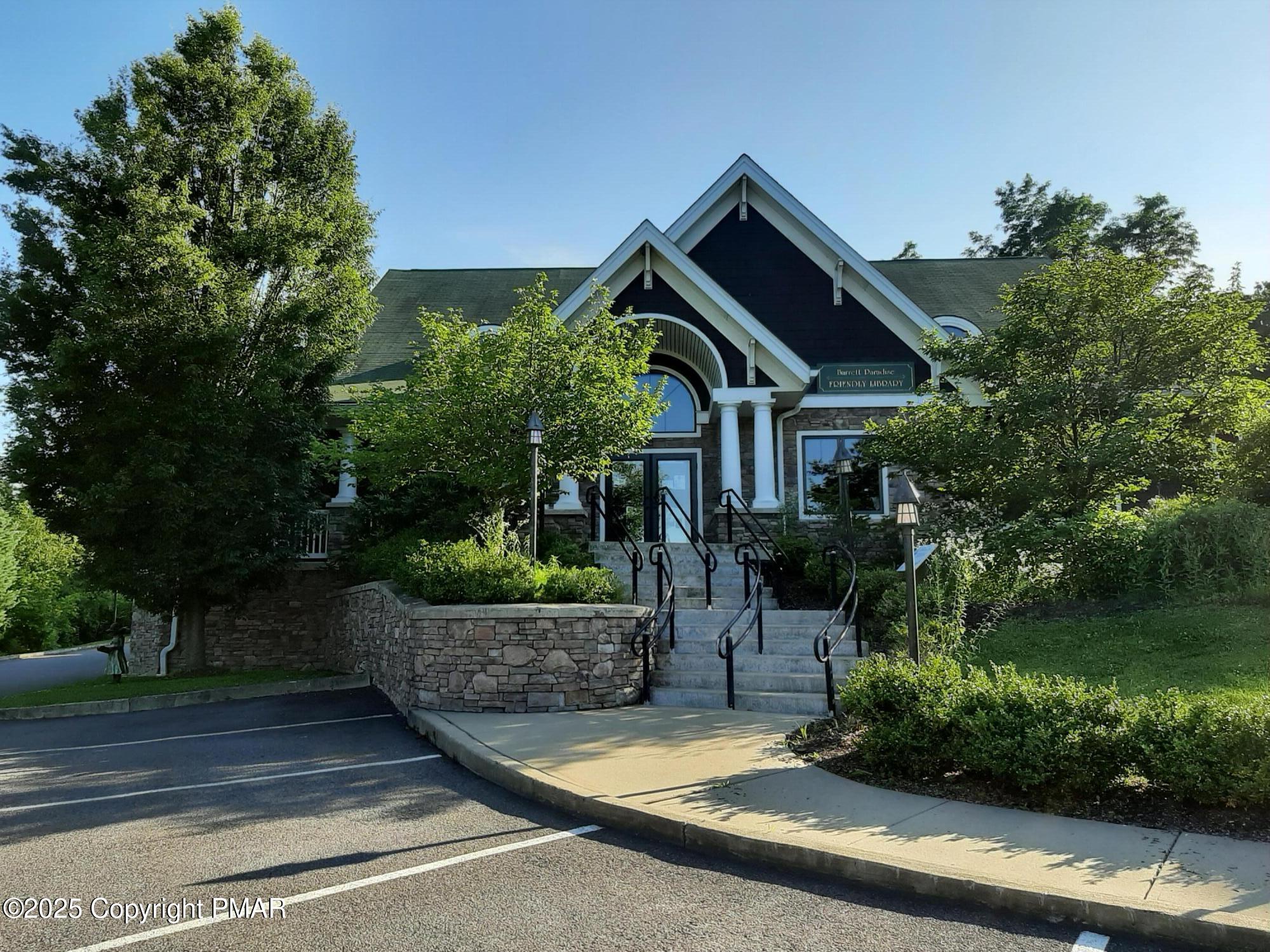 121 Hardytown Road Cresco, PA 18326 - Photo 27 of 35 a front view of a house with a garden