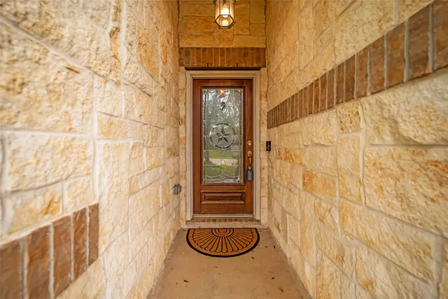a view of swimming pool with trees in the background