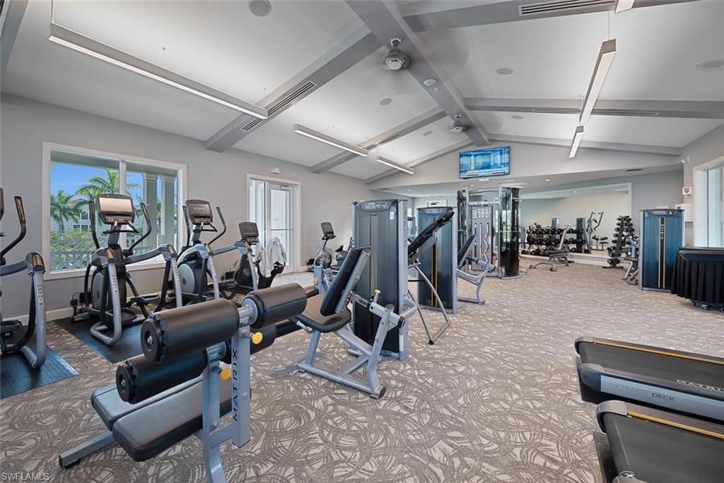 10709 Manatee Key Lane Estero, FL 33928 - Photo 16 of 18 a view of a room with gym equipment