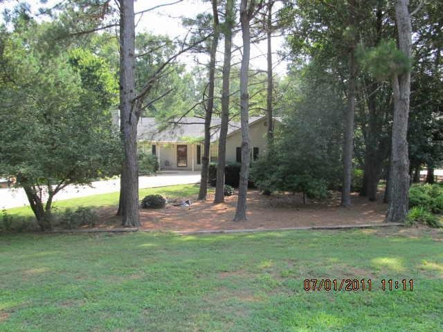 4355 Benefield Road Braselton, GA 30517 - Photo 1 of 1 a view of a park with a tree