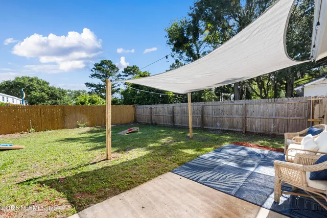 a view of a backyard with a slide