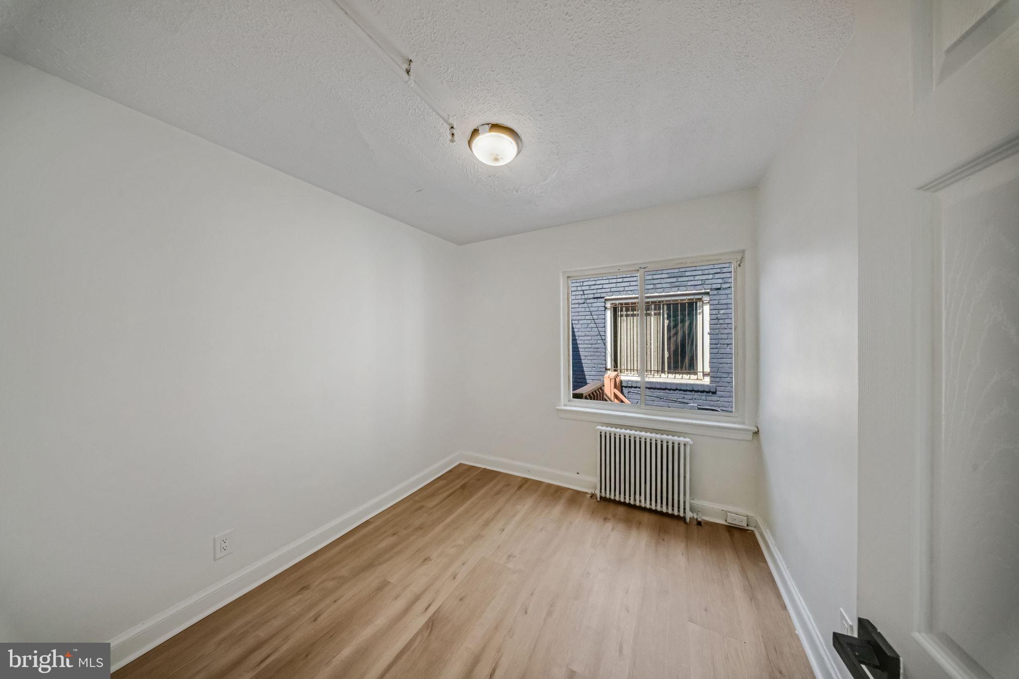 337 Delafield Place Northwest Washington, DC 20011 - Photo 5 of 72 Bright and airy blank canvas room.