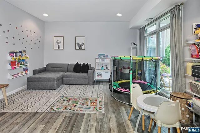 a living room with furniture and a table