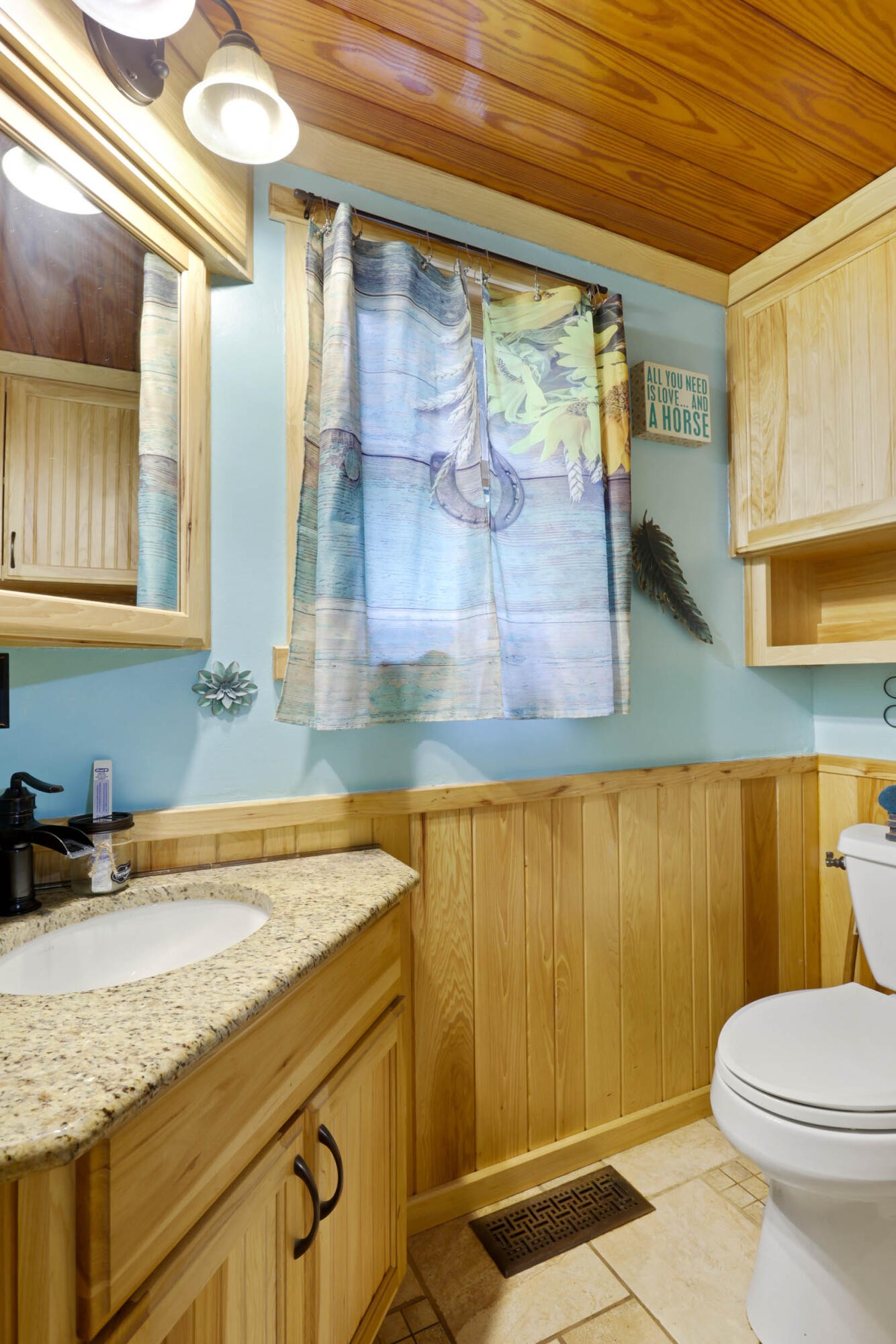 905 County Road 655 Athens, TN 37303 - Photo 21 of 47 a bathroom with a granite countertop sink and a mirror