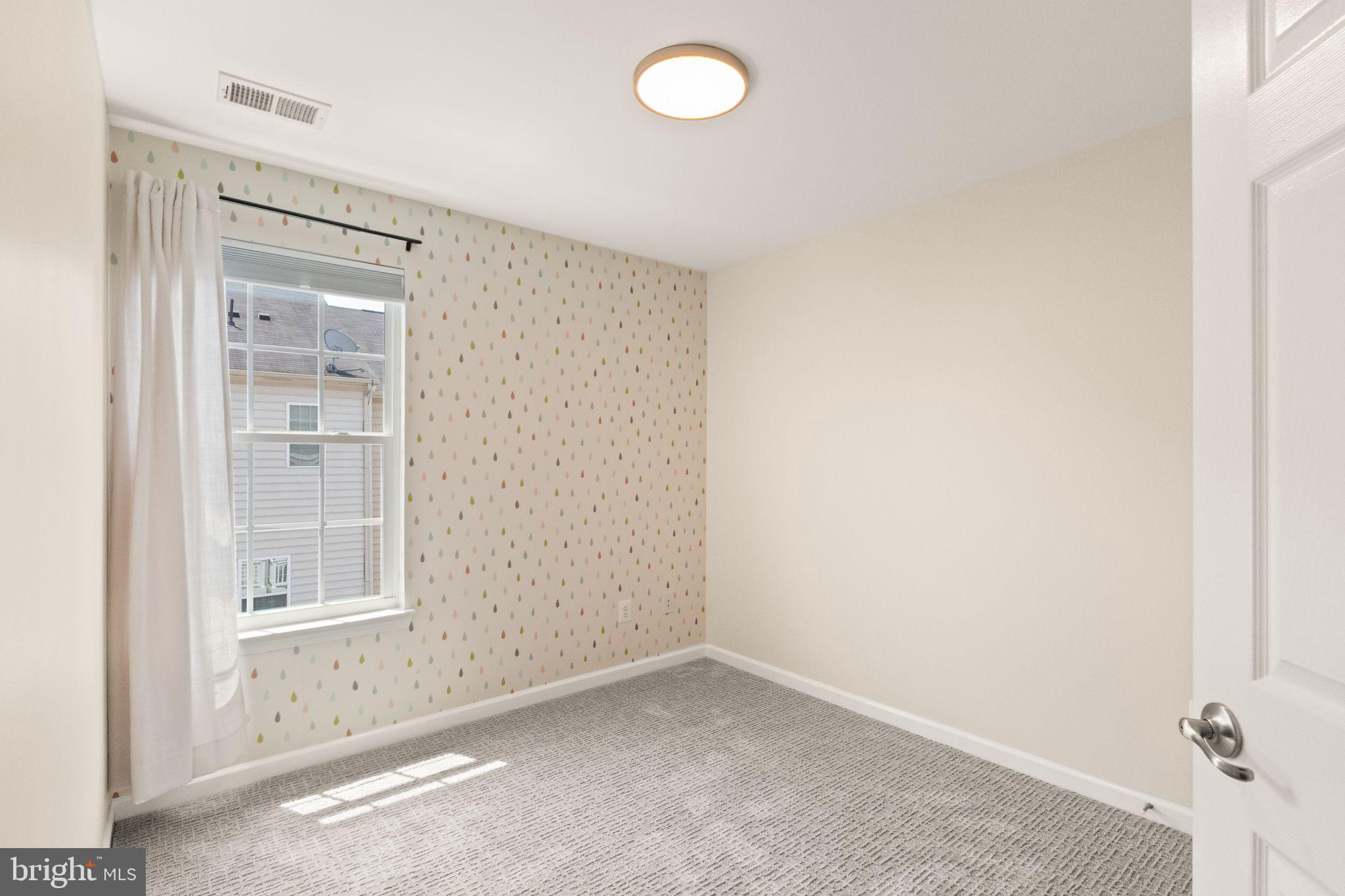 7015 Trek Way Gainesville, VA 20155 - Photo 30 of 56 Bedroom two with sweet accent wall
