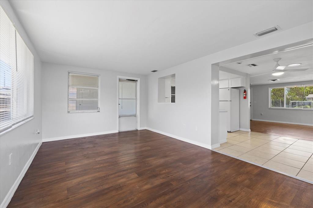 7330 Abalone Drive Port Richey, FL 34668 - Photo 25 of 49 an empty room with windows and closet