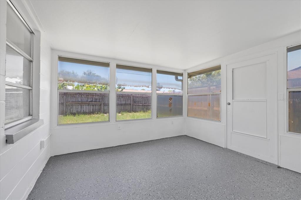 7330 Abalone Drive Port Richey, FL 34668 - Photo 27 of 49 an empty room with a window