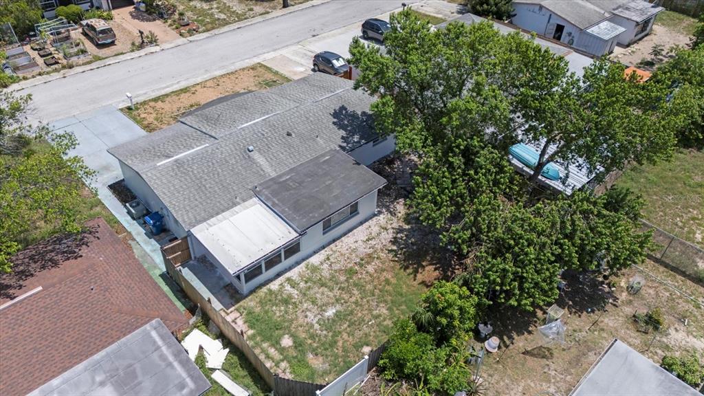 7330 Abalone Drive Port Richey, FL 34668 - Photo 45 of 49 an aerial view of a house with a yard