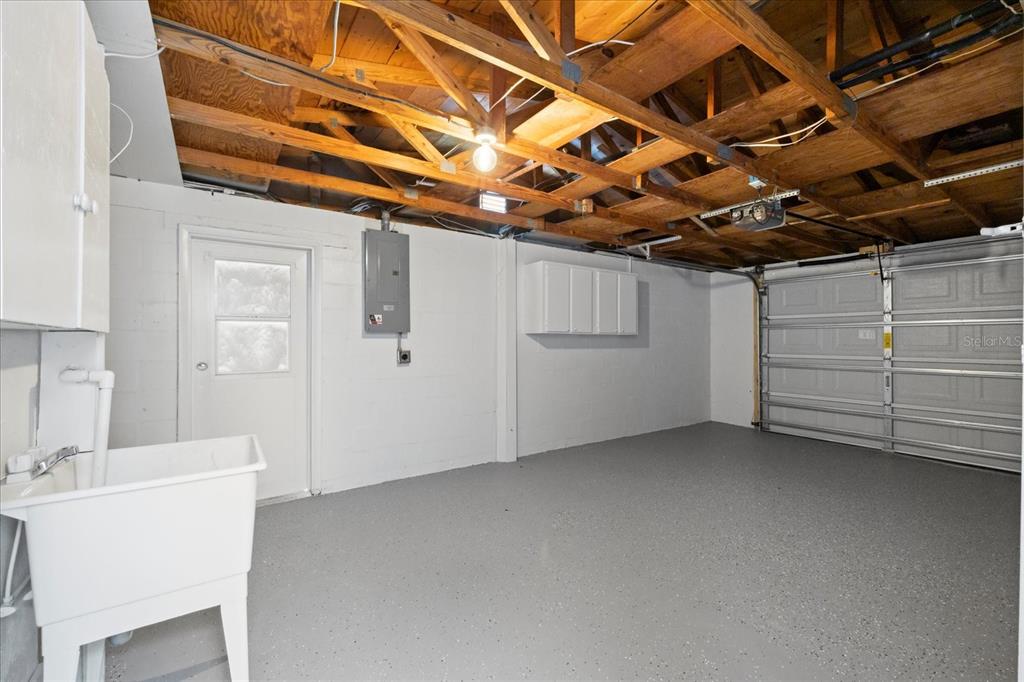 7330 Abalone Drive Port Richey, FL 34668 - Photo 7 of 49 a view of a room with storage