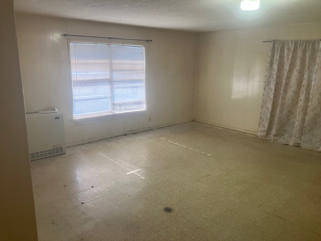 105 North Ave A Mason, TX 76856 - Photo 12 of 22 an empty room with a window