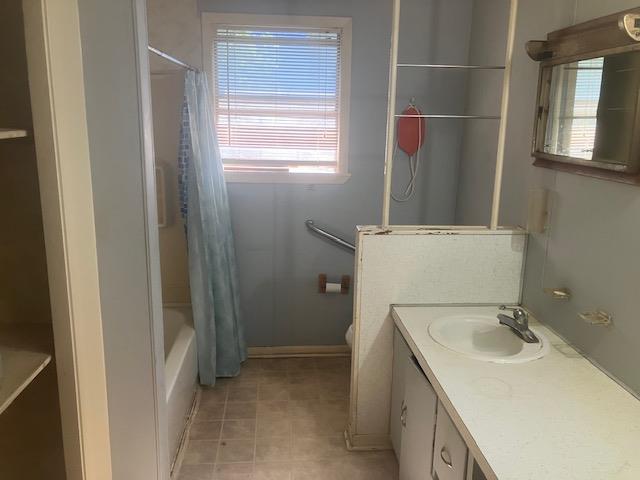 105 North Ave A Mason, TX 76856 - Photo 18 of 22 a bathroom with a sink vanity and mirror
