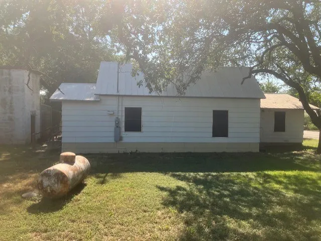 a view of a lake with a yard