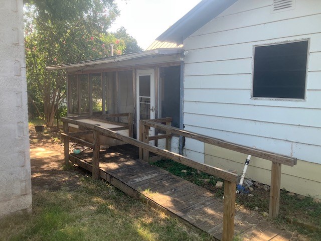 105 North Ave A Mason, TX 76856 - Photo 7 of 22 a view of house with backyard outdoor seating and hardwood