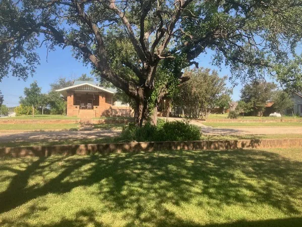 a view of workspace with furniture and windows