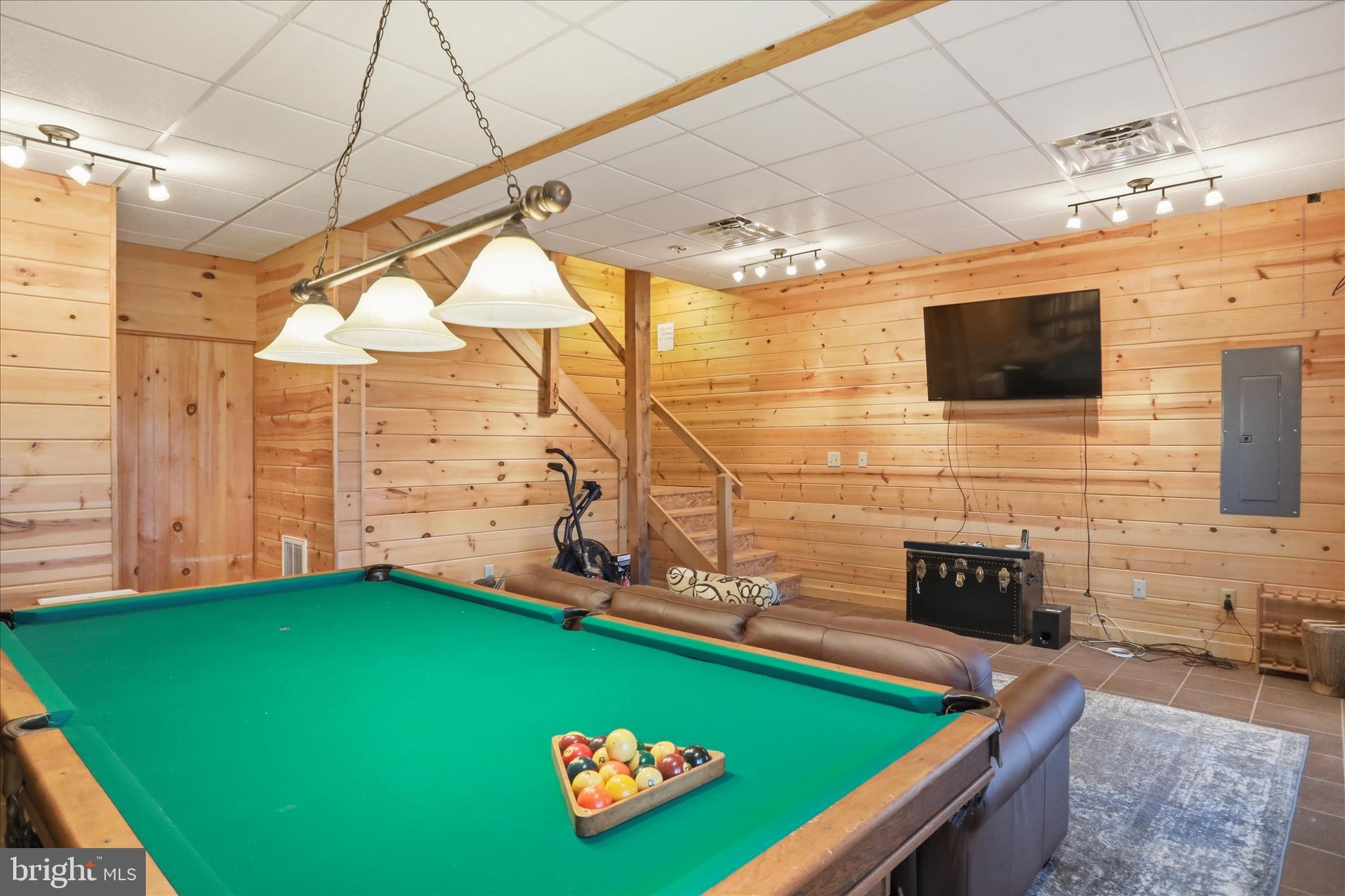 163 Olive Branch Road Rio, WV 26755 - Photo 28 of 70 a room with pool table and windows