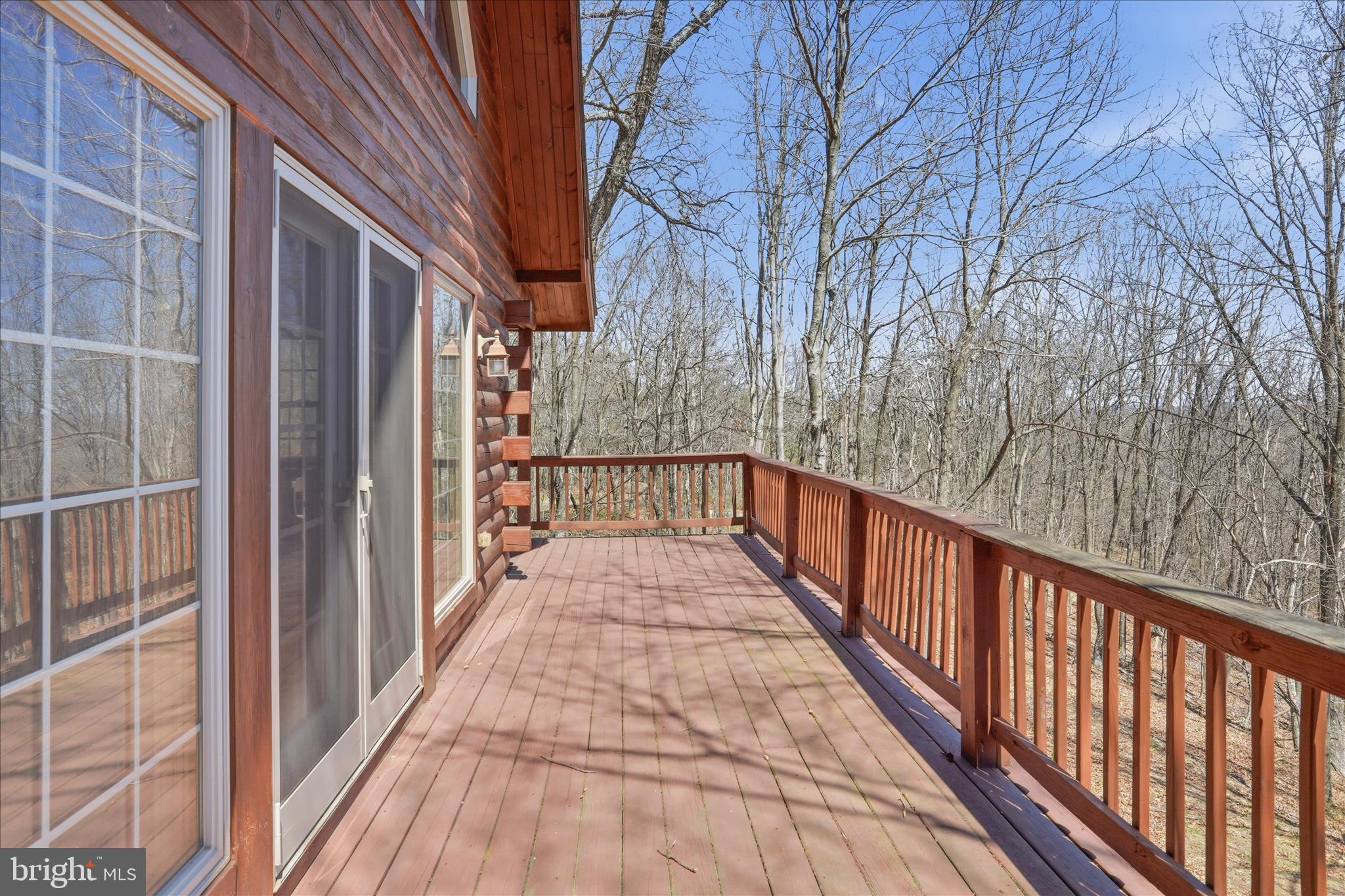 163 Olive Branch Road Rio, WV 26755 - Photo 35 of 70 a view of a balcony with wooden floor