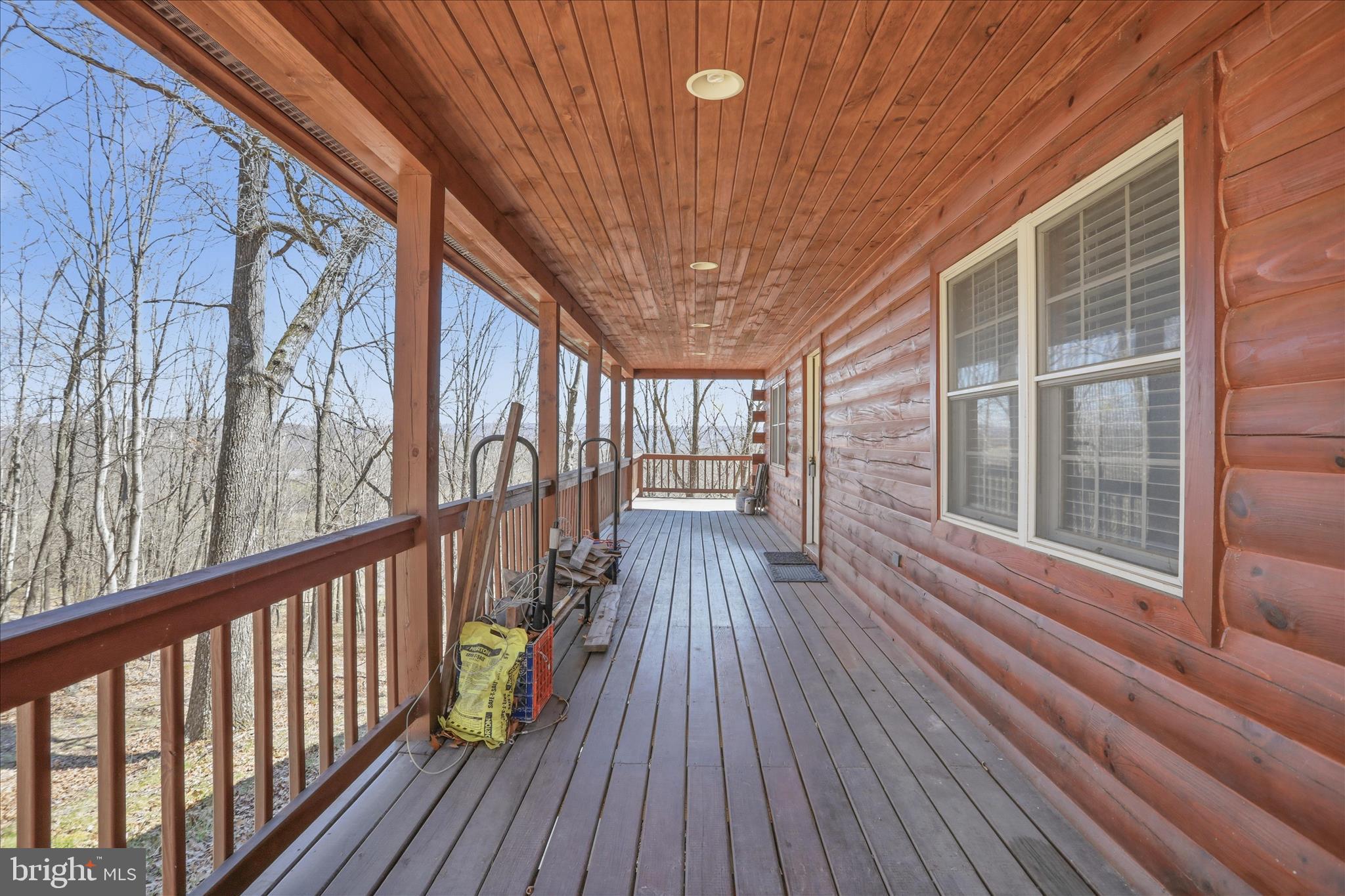 163 Olive Branch Road Rio, WV 26755 - Photo 4 of 70 a view of porch with wooden floor