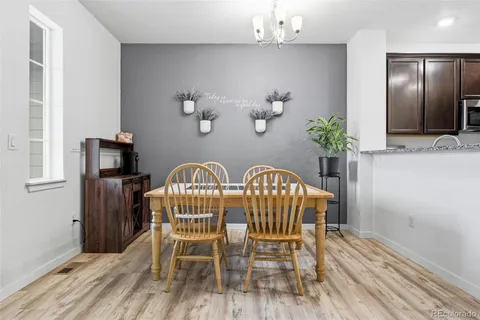 a view of a dining room with furniture