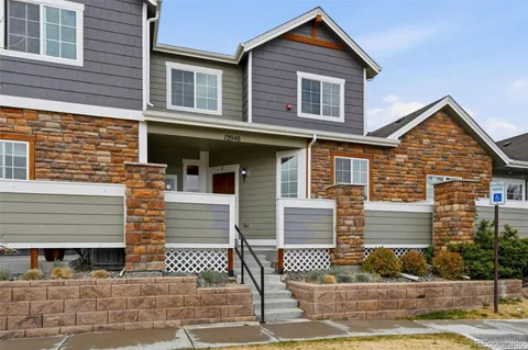 a front view of a house with a garage