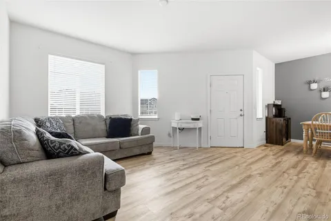 a living room with furniture and a couch