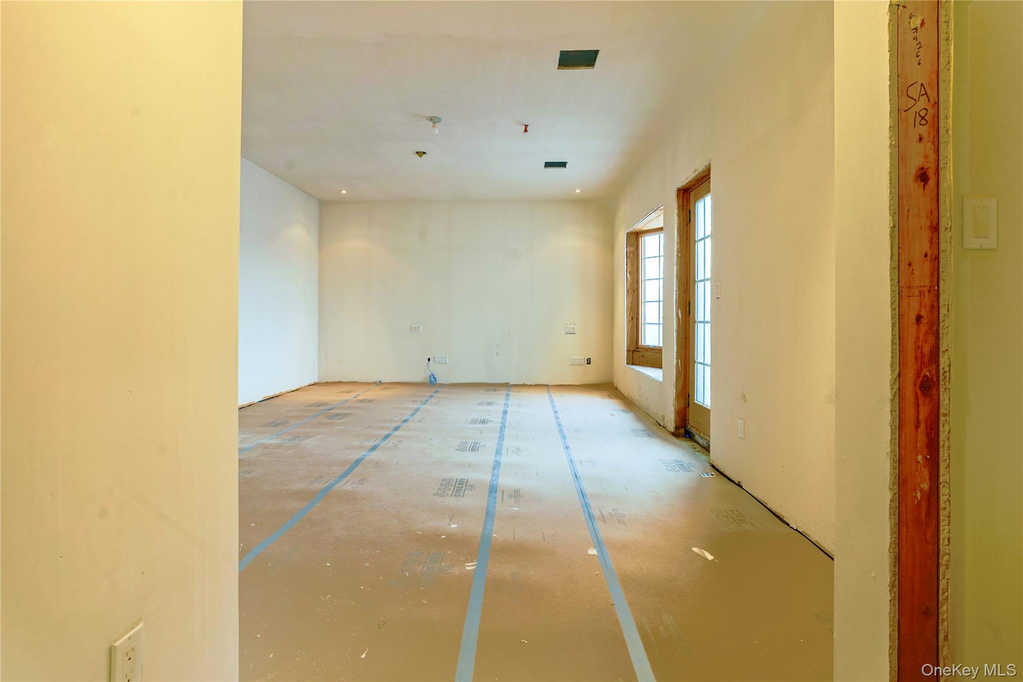 145 Classon Avenue, Unit 4A Brooklyn, NY 11205 - Photo 22 of 27 a view of room with window and a hallway