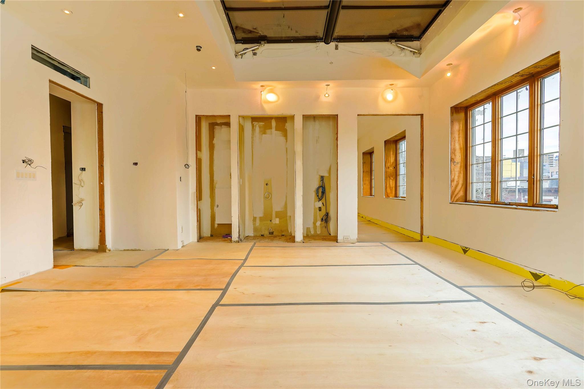 145 Classon Avenue, Unit 4A Brooklyn, NY 11205 - Photo 8 of 27 a view of an entryway with a chandelier