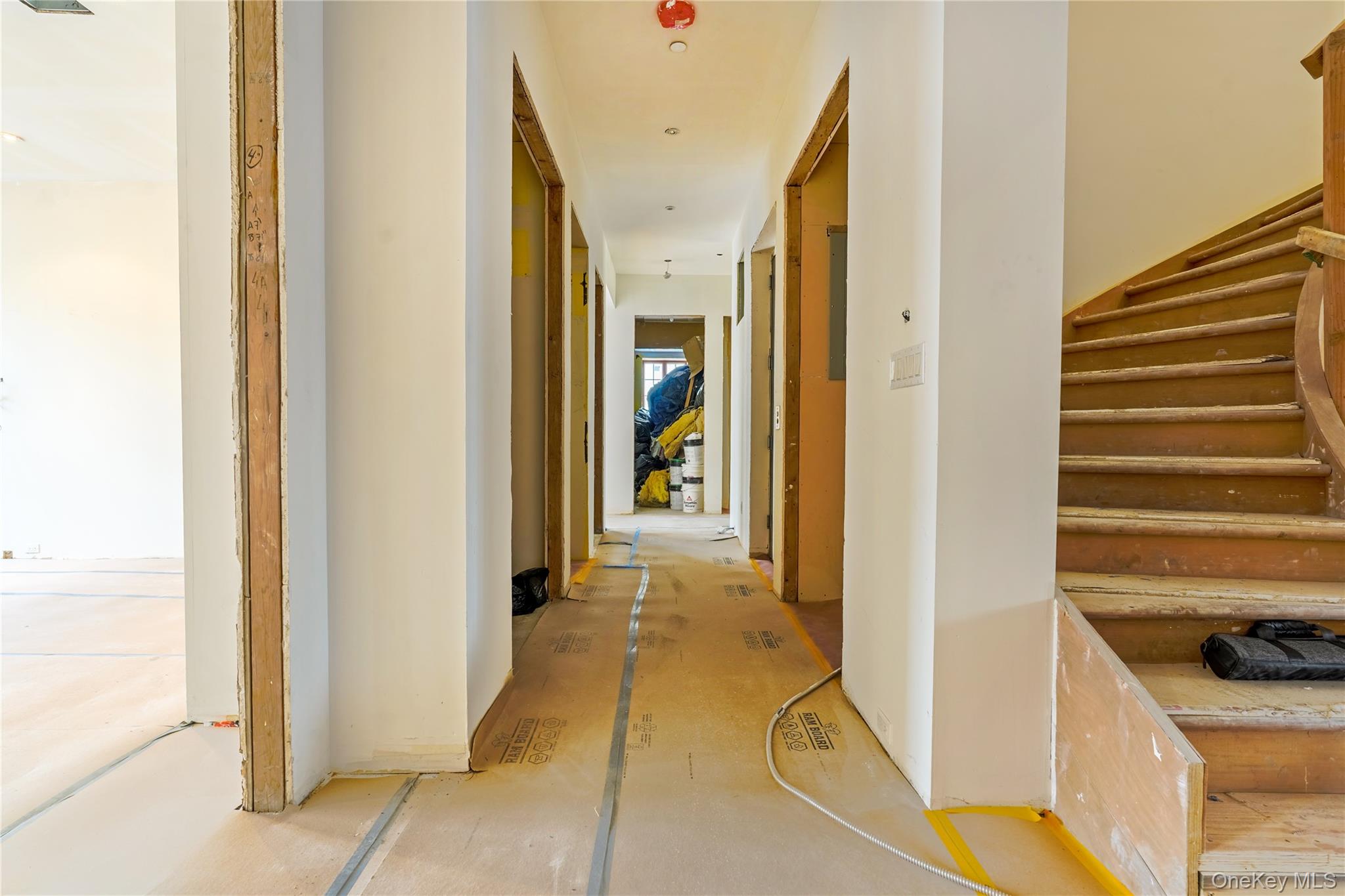 145 Classon Avenue, Unit 4A Brooklyn, NY 11205 - Photo 10 of 27 a view of a hallway with wooden floor and entryway