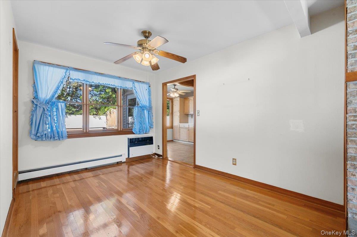 3 Surrey Lane Bethpage, NY 11714 - Photo 10 of 33 a view of an empty room with a window