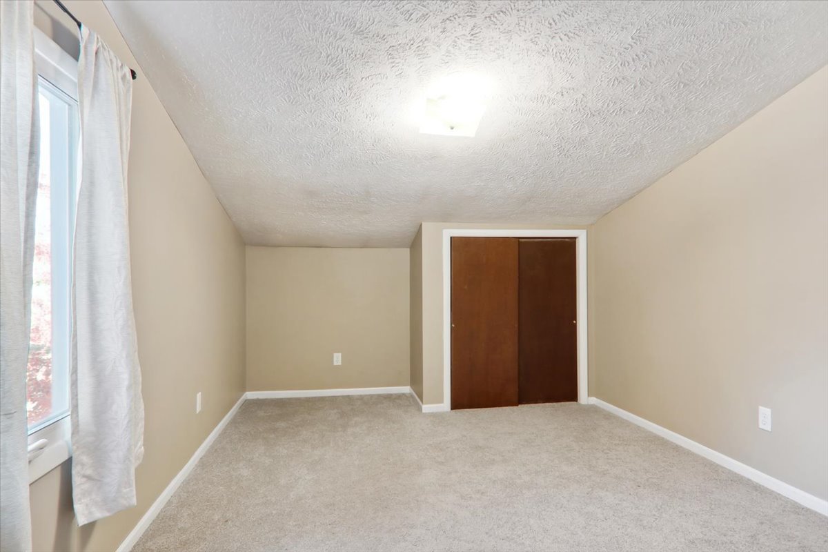 1544 Hunt Drive, Unit D Normal, IL 61761 - Photo 12 of 18 a view of an empty room