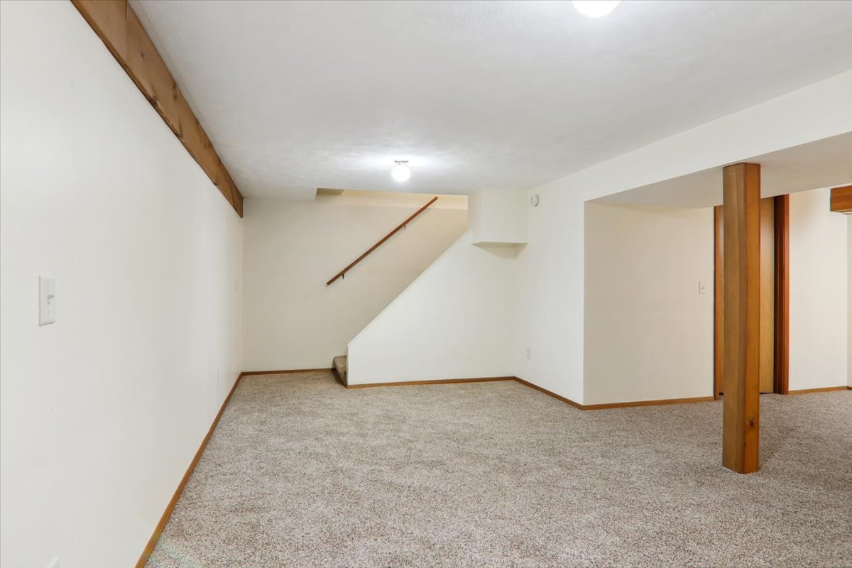 1544 Hunt Drive, Unit D Normal, IL 61761 - Photo 10 of 18 an empty room with windows