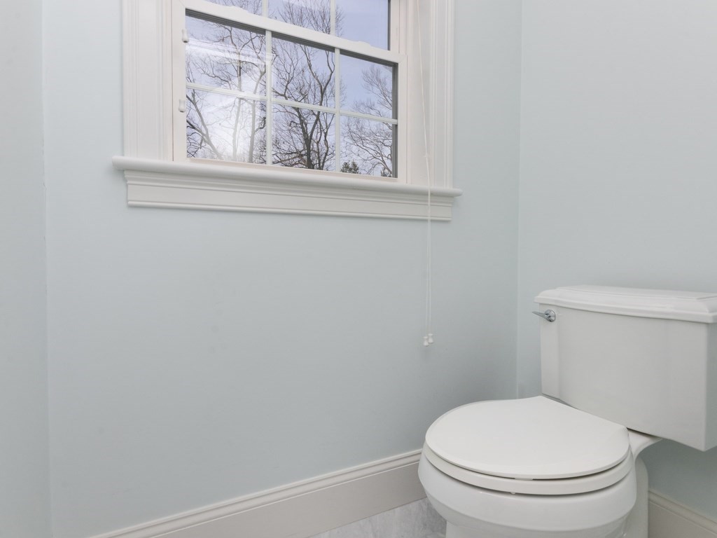 7 Garrett Spillane Road Foxboro, MA 02035 - Photo 25 of 36 a white toilet sitting next to a white wall