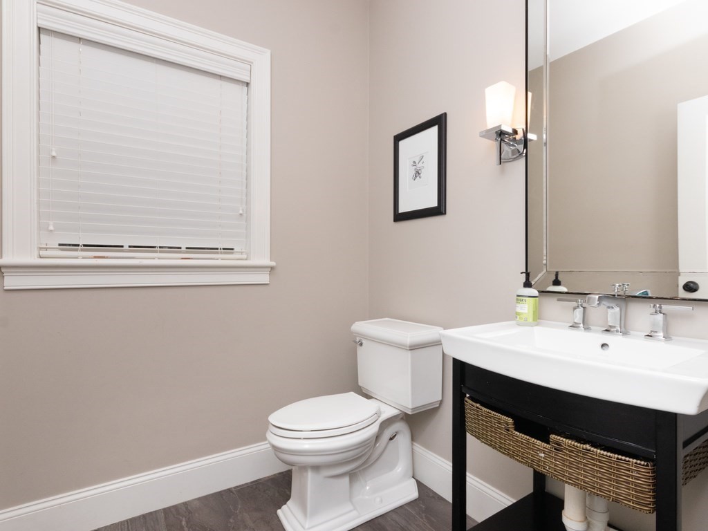 7 Garrett Spillane Road Foxboro, MA 02035 - Photo 29 of 36 a bathroom with a toilet a sink and a mirror