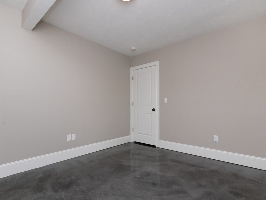 7 Garrett Spillane Road Foxboro, MA 02035 - Photo 32 of 36 an empty room with an entryway