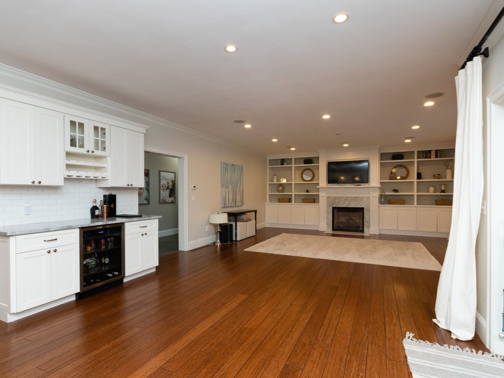 7 Garrett Spillane Road Foxboro, MA 02035 - Photo 9 of 36 a large kitchen with cabinets wooden floor and a stainless steel appliances