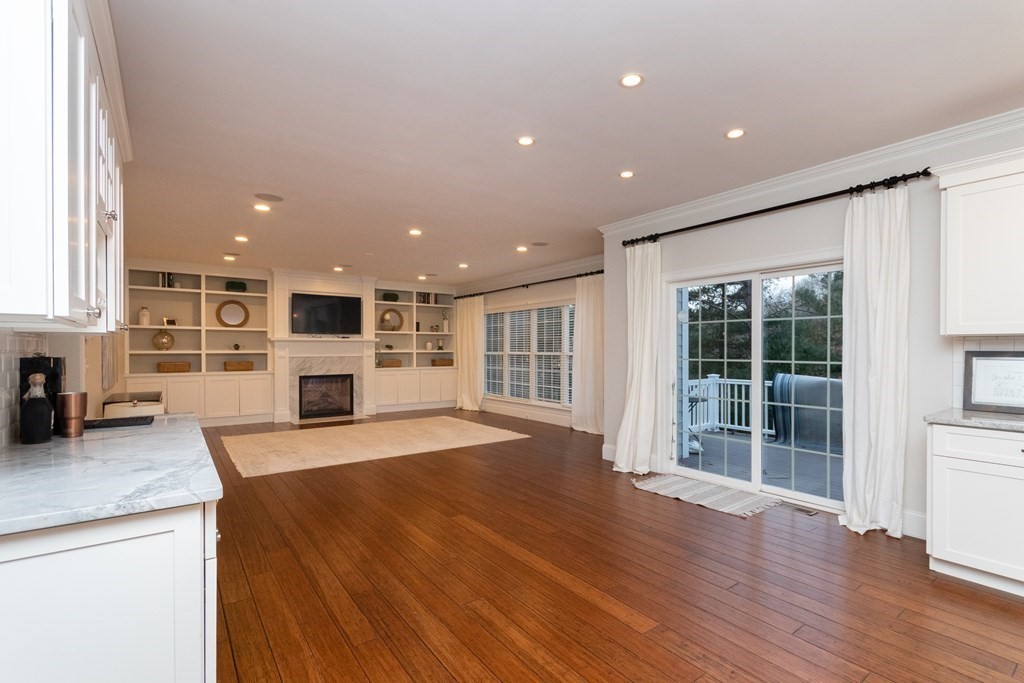 7 Garrett Spillane Road Foxboro, MA 02035 - Photo 10 of 36 a large kitchen with stainless steel appliances granite countertop a large counter top a stove and a sink