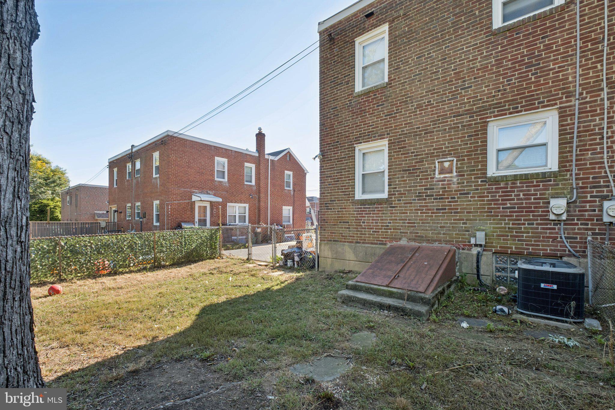 271 Drexel Avenue Lansdowne, PA 19050 - Photo 27 of 27 a backyard of a house with yard and outdoor seating