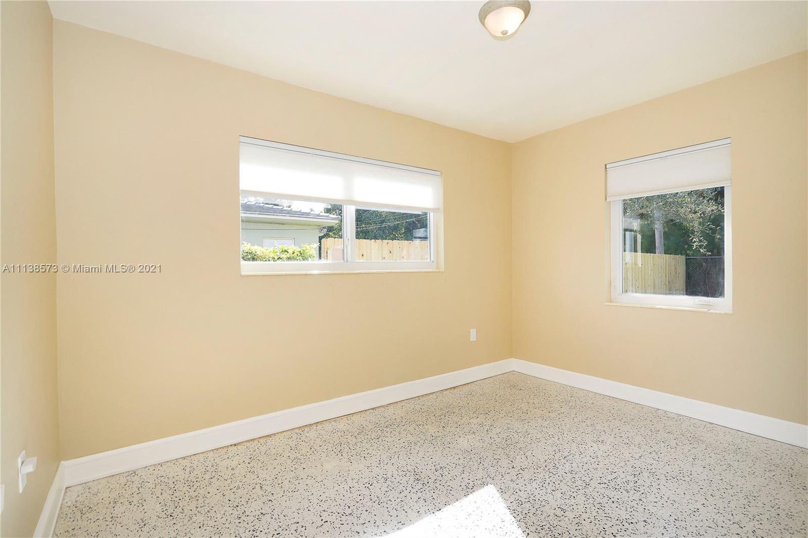 Glenvar Heights Miami, FL 33155 - Photo 20 of 22 a view of an empty room with a window